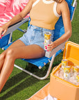 Hocus Pocus Now Focus cans in a cooler on the lawn